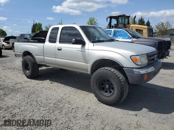 2000 Toyota Tacoma with VIN 5TEWN72N8YZ717707, listed as a Copart auction lot 54479455 with 197,407 mi miles and Salvage title. Bid and sale history available at DreamBid. Image 4.