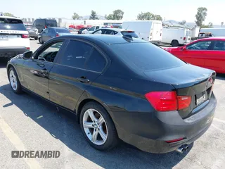2013 BMW 3 Series 328i with VIN WBA3C1C50DF435120, listed as a IAAI auction lot 42132086 with 137,588 mi miles and . Bid and sale history available at carsss.com. Image 3.
