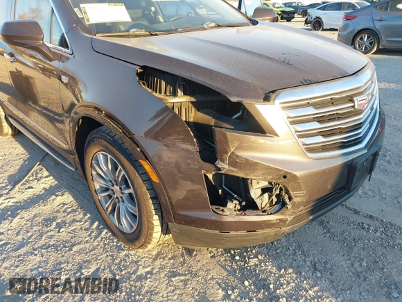 2017 Cadillac XT5 Luxury AWD with VIN 1GYKNDRS5HZ319787, listed as a IAAI auction lot 40819077 with 83,510 mi miles and . Bid and sale history available at DreamBid. Image 6.