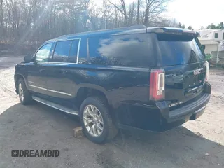 2015 GMC Yukon XL SLT with VIN 1GKS2HKC9FR159164, listed as a IAAI auction lot 41235420 with 136,730 mi miles. Bid and sale history available at carsss.com. Image 3.