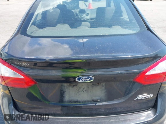 2014 Ford Fiesta S z VIN 3FADP4AJ2EM102020, wystawiony jako IAAI lot #42553222 z przebiegiem 145 052 mil mil oraz . Historia ofert i sprzedaży dostępna na DreamBid. Obrazek 14.