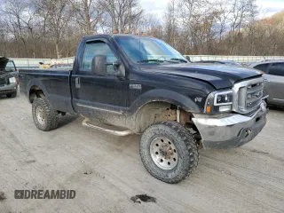 2000 Ford F-250 with VIN 1FTNF21S9YEA14056, listed as a Copart auction lot 80151994 with 165,477 mi miles and Salvage title. Bid and sale history available at DreamBid. Image 4.