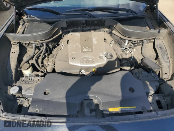 2015 Infiniti QX70 z VIN JN8CS1MW3FM483727, wystawiony jako Copart lot #55783285 z przebiegiem Nie podano mil oraz Czysty tytuł • Clean title. Historia ofert i sprzedaży dostępna na DreamBid. Obrazek 12.