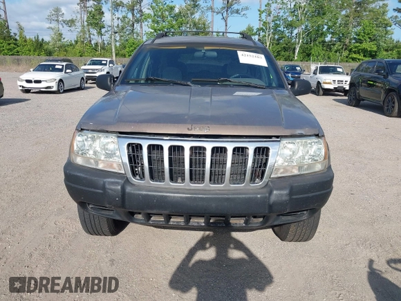 2001 Jeep Grand Cherokee Laredo with VIN 1J4GX48S91C559693, listed as a IAAI auction lot 42152103 with 152,713 mi miles and . Bid and sale history available at DreamBid. Image 6.
