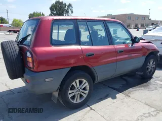 1999 Toyota RAV4 with VIN JT3GP10V0X0039083, listed as a IAAI auction lot 42061589 with 251,153 mi miles and . Bid and sale history available at DreamBid. Image 4.