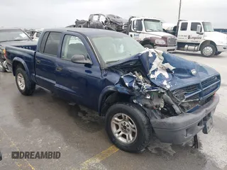 2003 Dodge Dakota Sport with VIN 1D7HL38X13S381160, listed as a IAAI auction lot 42191397 with 97,752 mi miles and . Bid and sale history available at DreamBid. Image 1.