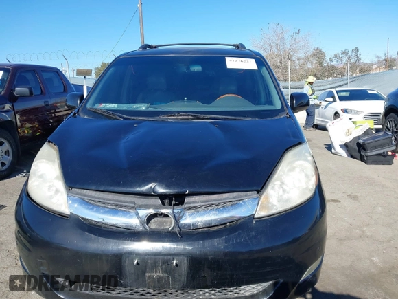 2009 Toyota Sienna XLE with VIN 5TDZK22C69S273555, listed as a IAAI auction lot 41276221 with 129,160 mi miles and . Bid and sale history available at DreamBid. Image 12.