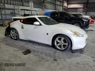 2012 Nissan 370Z z VIN JN1AZ4EH3CM565276, wystawiony jako Copart lot #56654845 z przebiegiem 77 788 mil mil oraz Nie do naprawy. Historia ofert i sprzedaży dostępna na DreamBid. Obrazek 4.