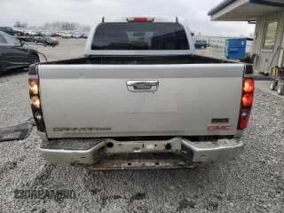 2012 GMC Canyon SLE1 with VIN 1GTD5MF9XC8156116, listed as a Copart auction lot 87413134 with 207,874 mi miles and Salvage Title. Bid and sale history available at carsss.com. Image 6.