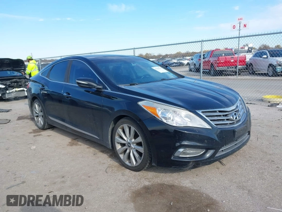 2014 Hyundai Azera Limited with VIN KMHFH4JG7EA353094, listed as a IAAI auction lot 41043222 with 184,924 mi miles and . Bid and sale history available at DreamBid. Image 1.