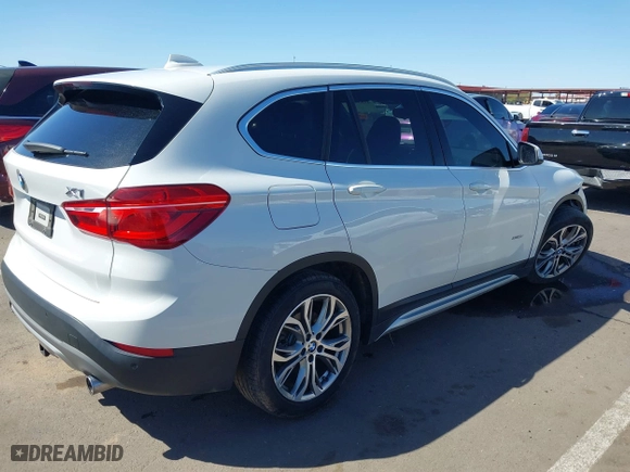 2017 BMW X1 xDrive28i with VIN WBXHT3C30H5F68187, listed as a IAAI auction lot 41830892 with 101,313 mi miles. Bid and sale history available at carsss.com. Image 4.
