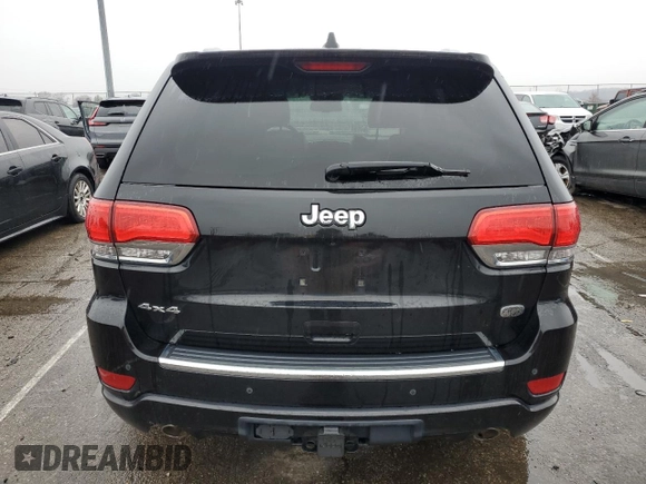 2015 Jeep Grand Cherokee Overland with VIN 1C4RJFCG7FC925995, listed as a Copart auction lot 85421214 with 142,266 mi miles and Salvage Title. Bid and sale history available at carsss.com. Image 6.