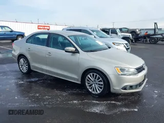 2013 Volkswagen Jetta TDI w/Premium with VIN 3VW3L7AJ5DM220867, listed as a IAAI auction lot 41484358 with 148,690 mi miles and . Bid and sale history available at DreamBid. Image 1.