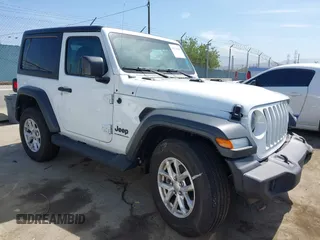 2023 Jeep Wrangler Sport S with VIN 1C4GJXAN4PW656756, listed as a IAAI auction lot 42328385 with 21,698 mi miles and . Bid and sale history available at DreamBid. Image 1.