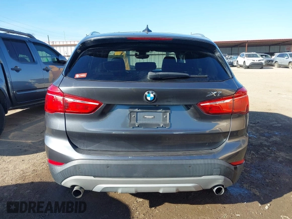 2017 BMW X1 sDrive28i with VIN WBXHU7C30H5H32753, listed as a IAAI auction lot 41441791 with 100,072 mi miles. Bid and sale history available at carsss.com. Image 17.