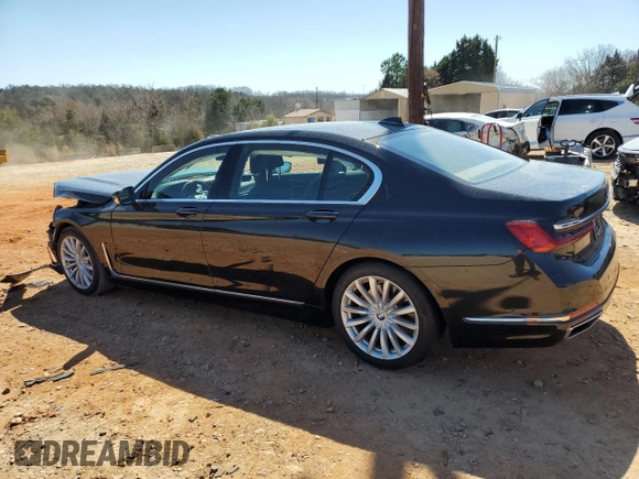 2020 BMW 7 Series 740i with VIN WBA7T2C07LCD79725, listed as a Copart auction lot 48498255 with 57,580 mi miles and Salvage title. Bid and sale history available at DreamBid. Image 2.
