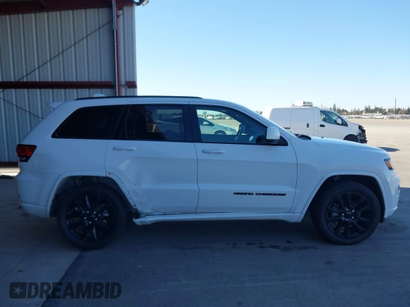 2020 Jeep Grand Cherokee Laredo E with VIN 1C4RJFAG9LC208058, listed as a IAAI auction lot 41430233 with 60,300 mi miles and . Bid and sale history available at DreamBid. Image 13.