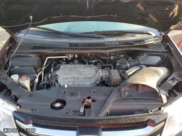 2016 Honda Odyssey SE with VIN 5FNRL5H38GB129450, listed as a Copart auction lot 49069535 with 70,621 mi miles and Salvage Title. Bid and sale history available at carsss.com. Image 12.