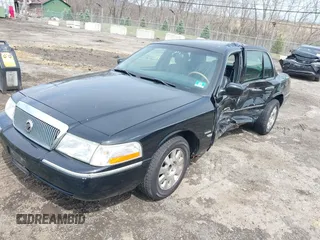 2005 Mercury Grand Marquis LS Premium z VIN 2MEFM75W65X671622, wystawiony jako IAAI lot #41958287 z przebiegiem 154 662 mil mil oraz . Historia ofert i sprzedaży dostępna na DreamBid. Obrazek 17.