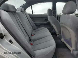 2004 Hyundai Elantra GLS z VIN KMHDN46D34U859307, wystawiony jako Copart lot #53847235 z przebiegiem 91 939 mil mil oraz Szkoda całkowita • Salvage title. Historia ofert i sprzedaży dostępna na DreamBid. Obrazek 10.