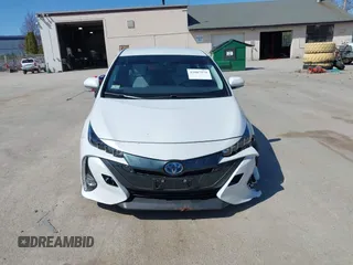 2021 Toyota Prius LE with VIN JTDKAMFP8M3174629, listed as a IAAI auction lot 42087974 with 16,348 mi miles and . Bid and sale history available at DreamBid. Image 12.