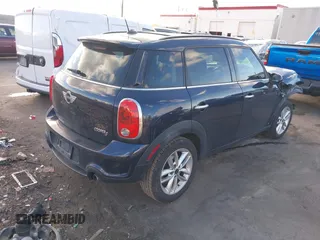 2013 MINI Countryman S with VIN WMWZC3C52DWP21475, listed as a IAAI auction lot 41215334 with 124,365 mi miles and . Bid and sale history available at DreamBid. Image 4.