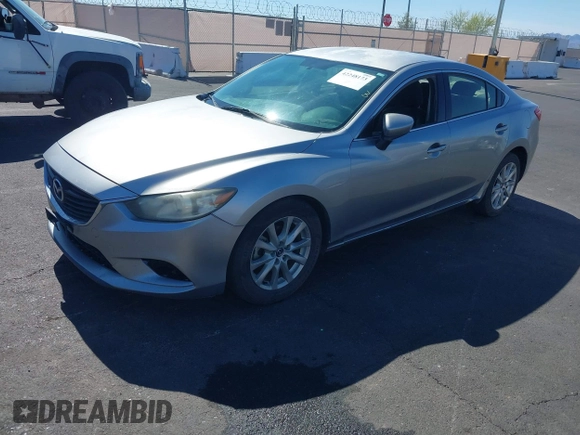 2014 Mazda 6 i Sport with VIN JM1GJ1U61E1151348, listed as a IAAI auction lot 42248173 with 275,764 mi miles and . Bid and sale history available at DreamBid. Image 2.