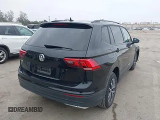 2021 Volkswagen Tiguan S with VIN 3VV1B7AX4MM025586, listed as a IAAI auction lot 41889996 with 21,777 mi miles and . Bid and sale history available at DreamBid. Image 4.