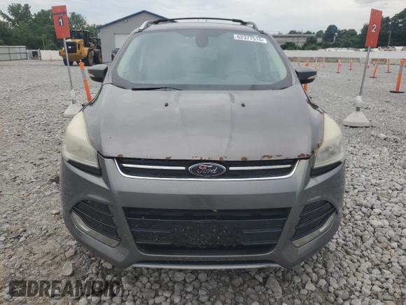 2013 Ford Escape SEL z VIN 1FMCU9HX7DUC11052, wystawiony jako Copart lot #62377515 z przebiegiem 225 704 mil mil oraz Szkoda całkowita • Salvage title. Historia ofert i sprzedaży dostępna na DreamBid. Obrazek 5.