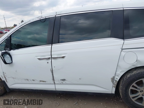 2012 Honda Odyssey EX-L with VIN 5FNRL5H67CB082903, listed as a IAAI auction lot 42015904 with 208,300 mi miles and . Bid and sale history available at carsss.com. Image 14.