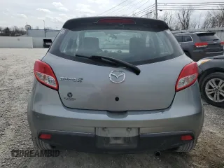2014 Mazda 2 Touring z VIN JM1DE1LY5E0176964, wystawiony jako Copart lot #48875405 z przebiegiem 128 264 mil mil oraz Szkoda całkowita • Salvage title. Historia ofert i sprzedaży dostępna na DreamBid. Obrazek 6.