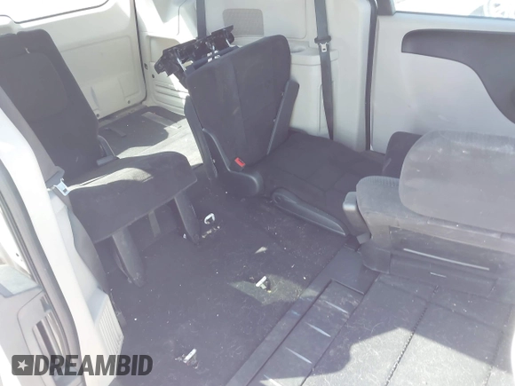 2012 Dodge Grand Caravan SXT with VIN 2C4RDGCGXCR365194, listed as a IAAI auction lot 42058530 with 131,059 mi miles and . Bid and sale history available at DreamBid. Image 8.