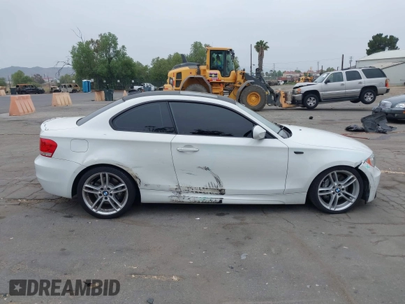 2013 BMW 1 Series 135i with VIN WBAUC9C54DVY60154, listed as a IAAI auction lot 42354743 with 159,571 mi miles and . Bid and sale history available at DreamBid. Image 13.