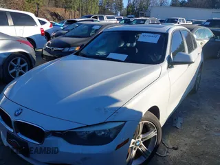 2014 BMW 3 Series 328i with VIN WBA3C1C58EK109865, listed as a IAAI auction lot 41290811 with 146,258 mi miles. Bid and sale history available at carsss.com. Image 2.