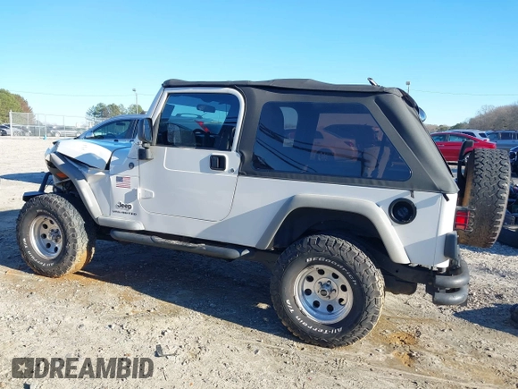 2005 Jeep Wrangler Unlimited with VIN 1J4FA44SX5P316055, listed as a IAAI auction lot 41586898 with 218,181 mi miles. Bid and sale history available at carsss.com. Image 14.