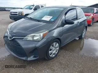 2015 Toyota Yaris L with VIN VNKJTUD33FA054166, listed as a IAAI auction lot 41993354 with 98,657 mi miles and . Bid and sale history available at DreamBid. Image 2.