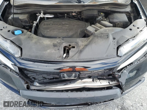 2019 Honda Passport Elite with VIN 5FNYF8H06KB003641, listed as a Copart auction lot 58218825 with 139,616 mi miles and Salvage title. Bid and sale history available at DreamBid. Image 12.