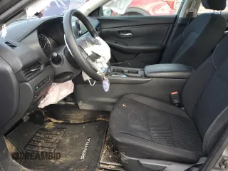 2023 Nissan Sentra S z VIN 3N1AB8BV8PY301530, wystawiony jako Copart lot #49204955 z przebiegiem 29 544 mil mil oraz Szkoda całkowita • Salvage title. Historia ofert i sprzedaży dostępna na DreamBid. Obrazek 7.