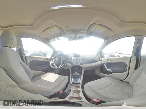 2013 Ford Fiesta SE z VIN 3FADP4EJ8DM146676, wystawiony jako Copart lot #55565485 z przebiegiem 168 801 mil mil oraz Szkoda całkowita • Salvage title. Historia ofert i sprzedaży dostępna na DreamBid. Obrazek 14.