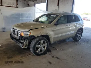 2011 Jeep Grand Cherokee Overland with VIN 1J4RR6GG4BC684484, listed as a Copart auction lot 57332765 with 106,082 mi miles and Salvage title. Bid and sale history available at DreamBid. Image 1.