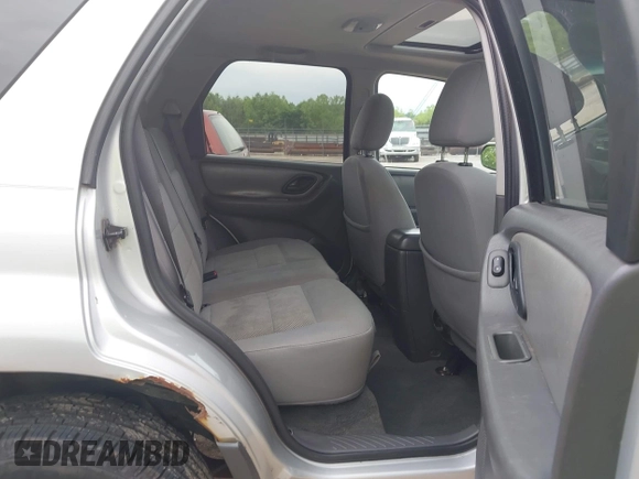 2006 Ford Escape XLT z VIN 1FMYU03136KA68913, wystawiony jako IAAI lot #42265822 z przebiegiem 129 401 mil mil oraz . Historia ofert i sprzedaży dostępna na DreamBid. Obrazek 8.