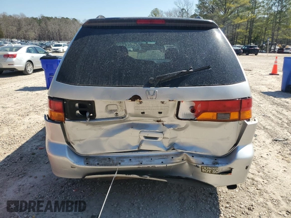 2004 Honda Odyssey EX-L with VIN 5FNRL18974B074613, listed as a Copart auction lot 48924865 with 212,633 mi miles and Salvage Title. Bid and sale history available at DreamBid. Image 6.