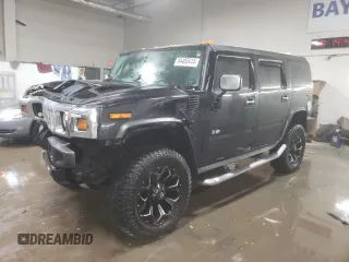 2003 Hummer H2 with VIN 5GRGN23U33H143023, listed as a Copart auction lot 84403414 with 0 mi miles and Salvage Title. Bid and sale history available at carsss.com. Image 1.