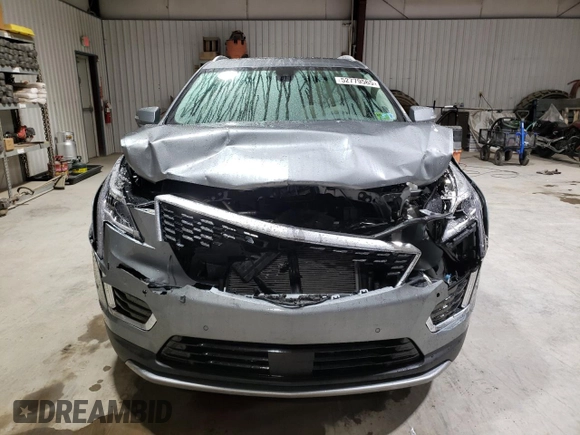 2023 Cadillac XT5 AWD Premium Luxury with VIN 1GYKNDRS5PZ221261, listed as a Copart auction lot 52779565 with 7,098 mi miles and Salvage Title. Bid and sale history available at DreamBid. Image 5.