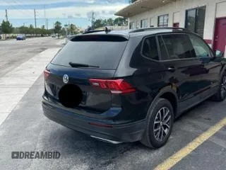 2021 Volkswagen Tiguan S with VIN 3VV1B7AX9MM105997, listed as a Copart auction lot 57079115 with 146,399 mi miles and Clean title. Bid and sale history available at DreamBid. Image 4.