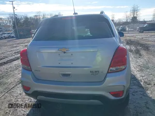 2019 Chevrolet Trax LT z VIN KL7CJLSBXKB962501, wystawiony jako IAAI lot #41446135 z przebiegiem 134 864 mil mil oraz . Historia ofert i sprzedaży dostępna na DreamBid. Obrazek 16.