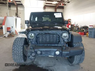 2012 Jeep Wrangler Unlimited Sport with VIN 1C4BJWDG8CL246829, listed as a IAAI auction lot 41816197 with 198,502 mi miles. Bid and sale history available at carsss.com. Image 13.