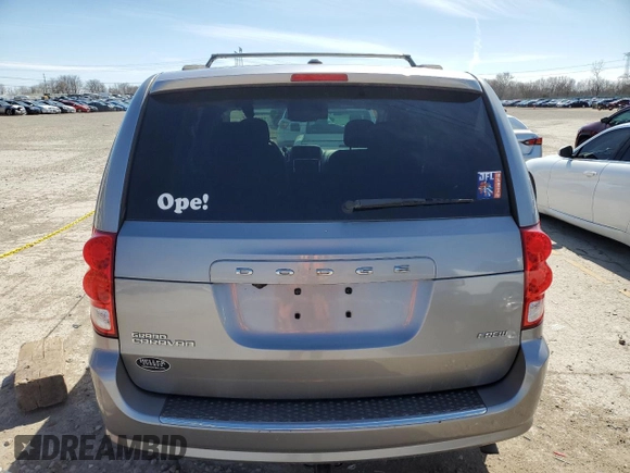2013 Dodge Grand Caravan Crew with VIN 2C4RDGDG7DR795748, listed as a Copart auction lot 50329195 with 223,956 mi miles and Salvage Title. Bid and sale history available at DreamBid. Image 6.
