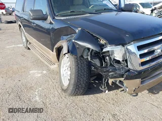 2014 Ford Expedition King Ranch z VIN 1FMJU1J58EEF21353, wystawiony jako IAAI lot #41977079 z przebiegiem 141 225 mil mil oraz . Historia ofert i sprzedaży dostępna na DreamBid. Obrazek 6.