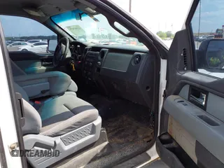 2013 Ford F-150 XL w/HD Payload Pkg with VIN 1FTVX1CF8DKD55791, listed as a IAAI auction lot 41987479 with 285,410 mi miles. Bid and sale history available at carsss.com. Image 5.